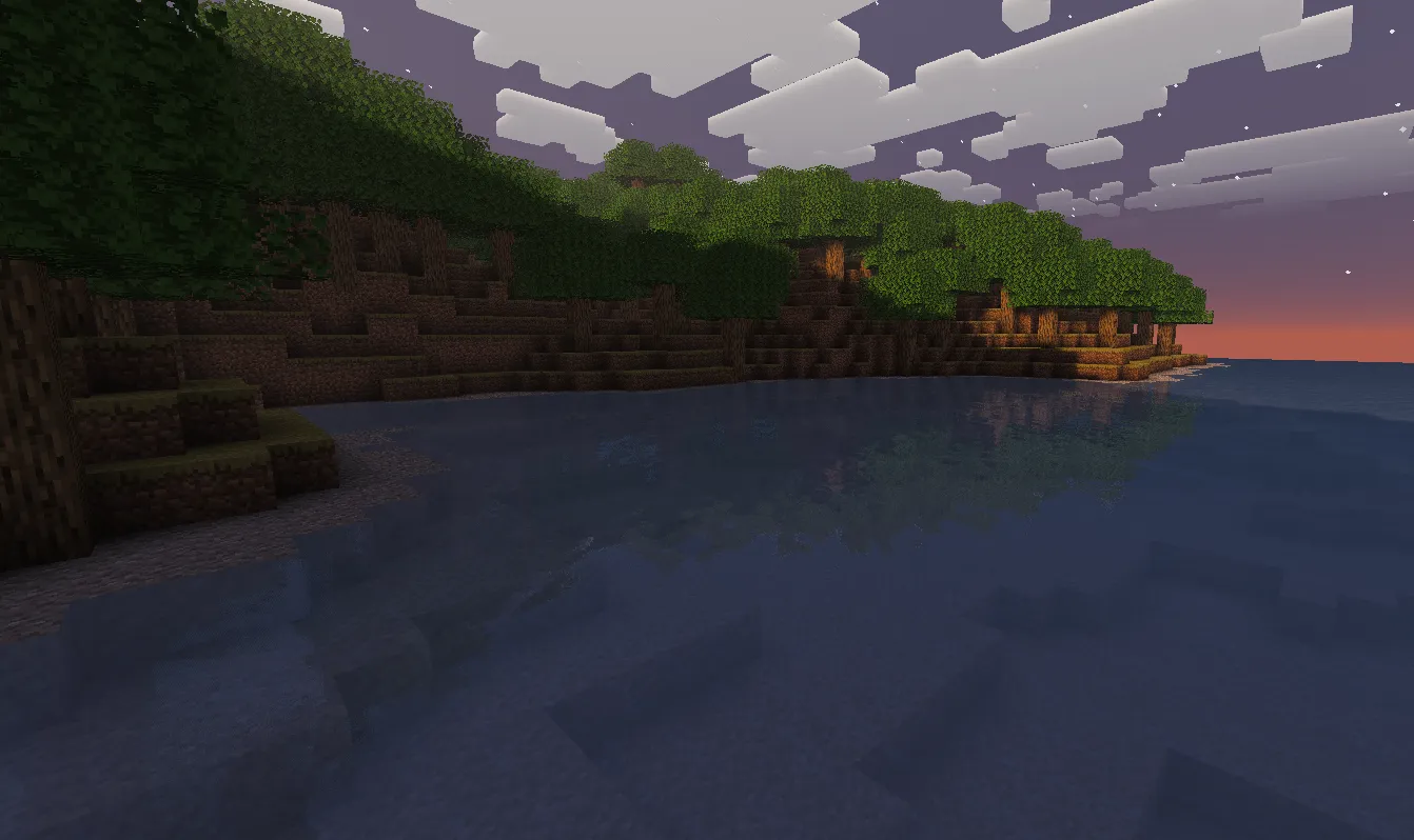 Water surface at sunset with deep orange and purple tones